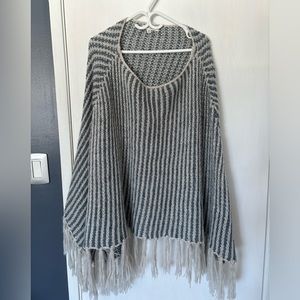 Handmade cashmere-like poncho
